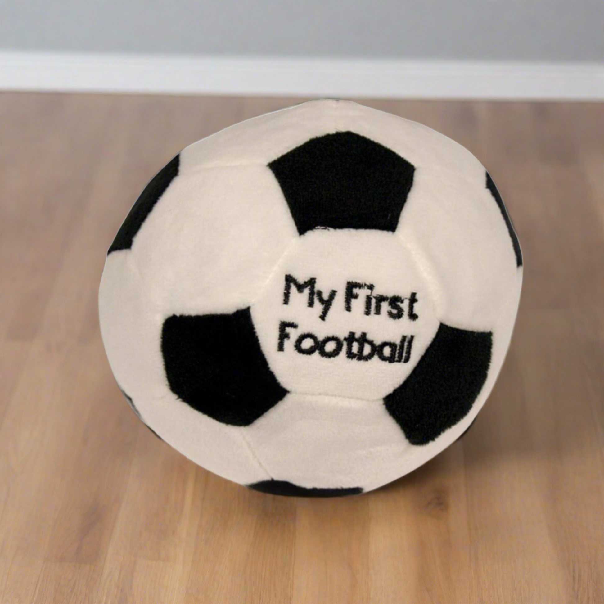 Soft baby toy, my first football. Measuring 15cm made from soft plush materials with a rattle sound within. (front angle)