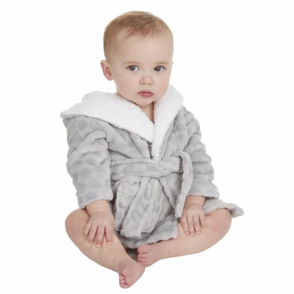 Unisex Baby Clothes - Baby wearing a dressing gown in grey with hood, featuring a circular textured design throughout.