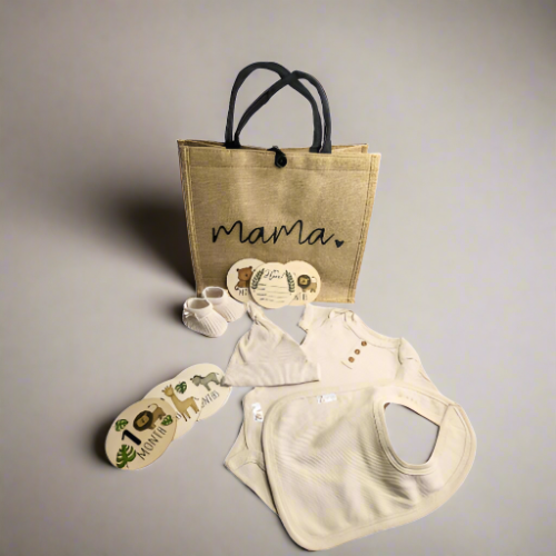 Mummy to be gift hamper with a hessian bag, milestone discs, eco-friendly baby clothing, and baby booties